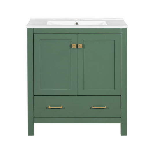 A green Bathroom Vanity With Single Sink features gold handles, 2 soft-closing doors, a bottom drawer, a solid wood frame, and is topped with a white undermount sink for multifunctional bathroom storage.