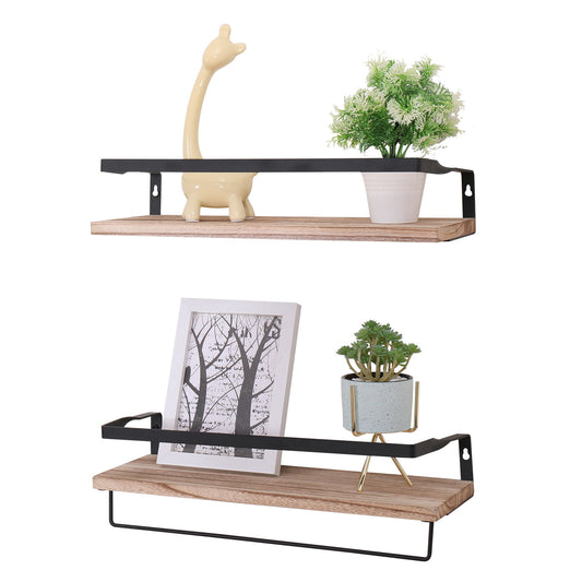 Set of 2 Floating Shelves, Long Wall Shelves in natural wood with black brackets. Top shelf displays a yellow giraffe figurine and small potted plant; bottom shelf holds a framed tree photo and potted succulent in a decorative planter.