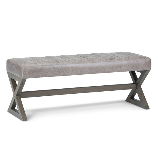 The Salinger - Large Upholstered Ottoman Bench features a light gray cushioned seat with dark wooden X-shaped legs and support bars, shown against a plain white background.