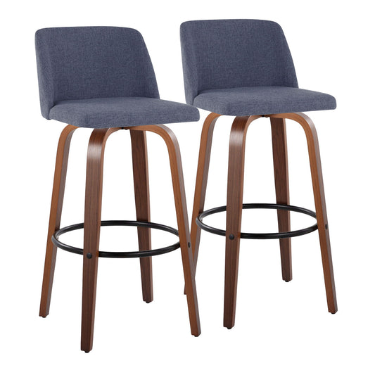 The Toriano Mid Century Modern Barstool set features two stools with curved wooden legs, round black footrests, and blue-gray upholstered seats and backrests, shown side by side against a white background.