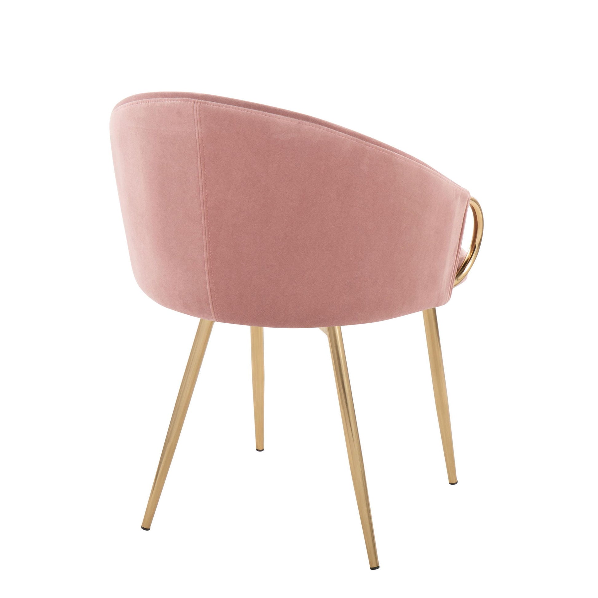 The Claire - Contemporary Glam Chair features a curved blush pink upholstered backrest, gold metal legs, and a decorative gold ring handle on the back, shown here from an angled rear view.