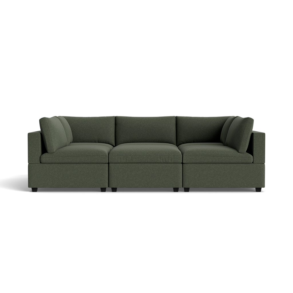The Kova Box Cushion Pit is a modern dark green sectional sofa with three seat sections and cushioned backrests, shown from the front against a solid black background.