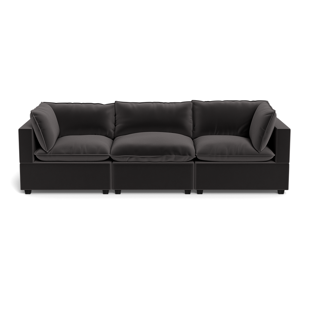 The Kova Pillow Cushion Sofa 122" is a modern black three-seater with plush back and seat cushions, slightly angled armrests, and a minimalist front-facing design set against a plain background.