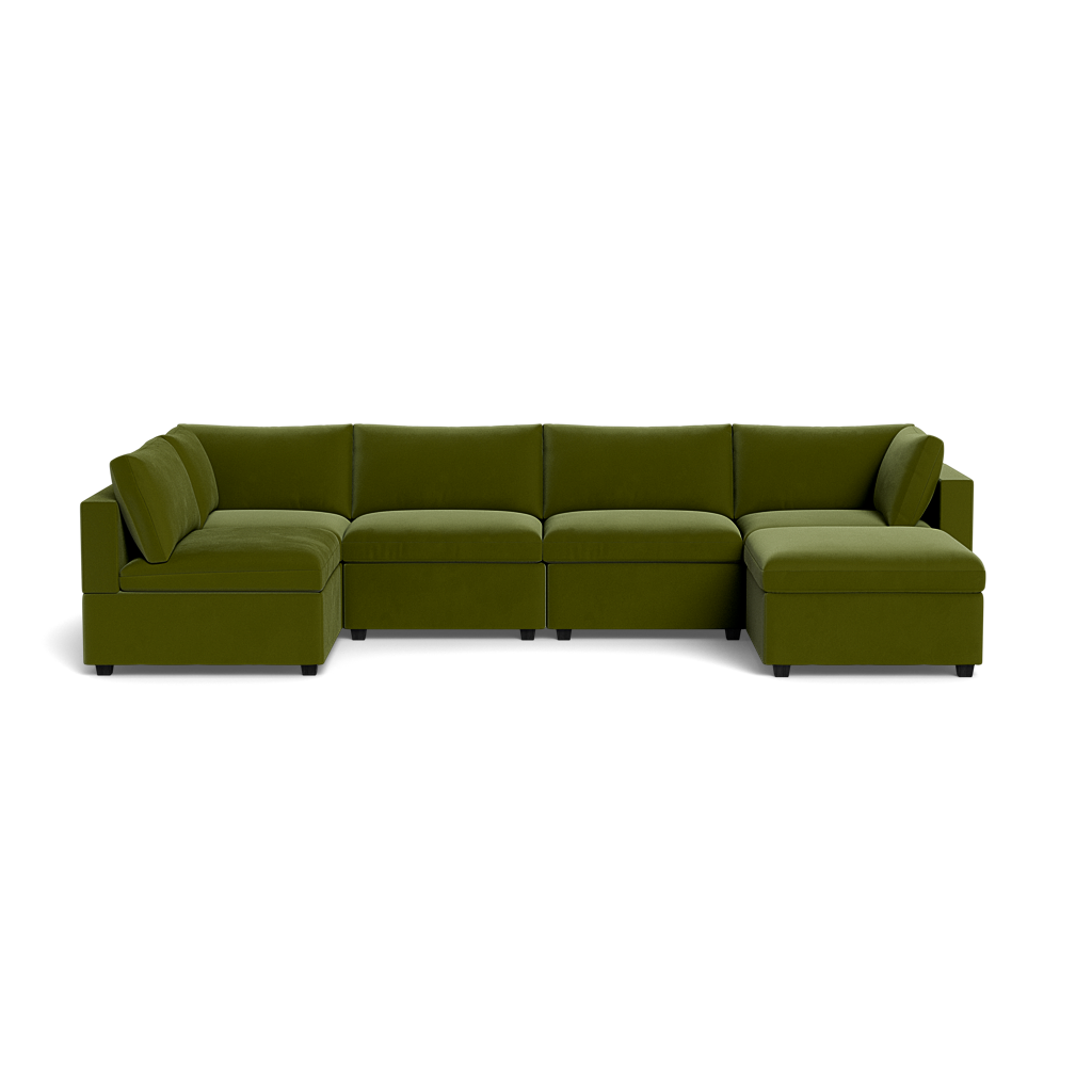 The Kova Box Cushion U-Shape is a large, modern sectional sofa in olive green with multiple seat cushions, low backrests, and square arms, shown against a black background.