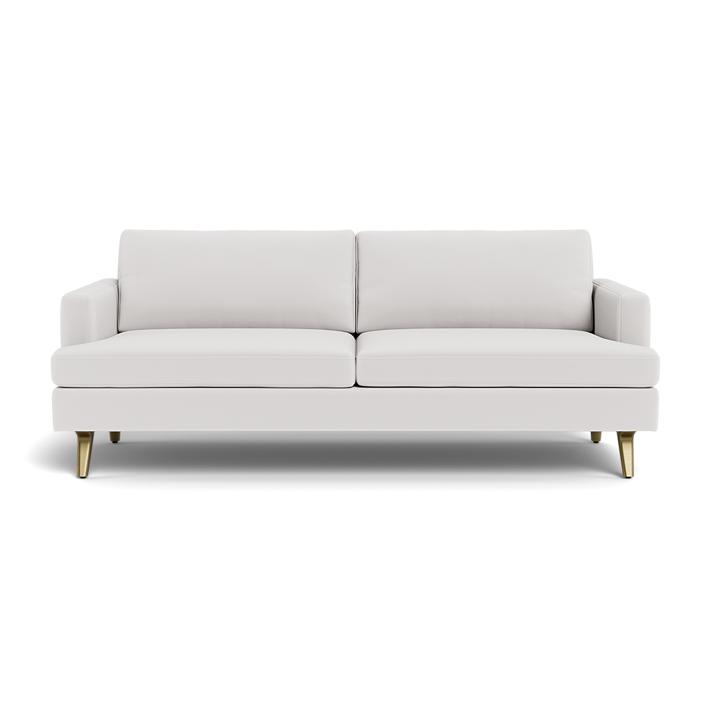 The Lido Sofa 75" is a modern white sofa with two seat cushions, two back cushions, low armrests, gold-colored angled legs, and a clean minimalist design.