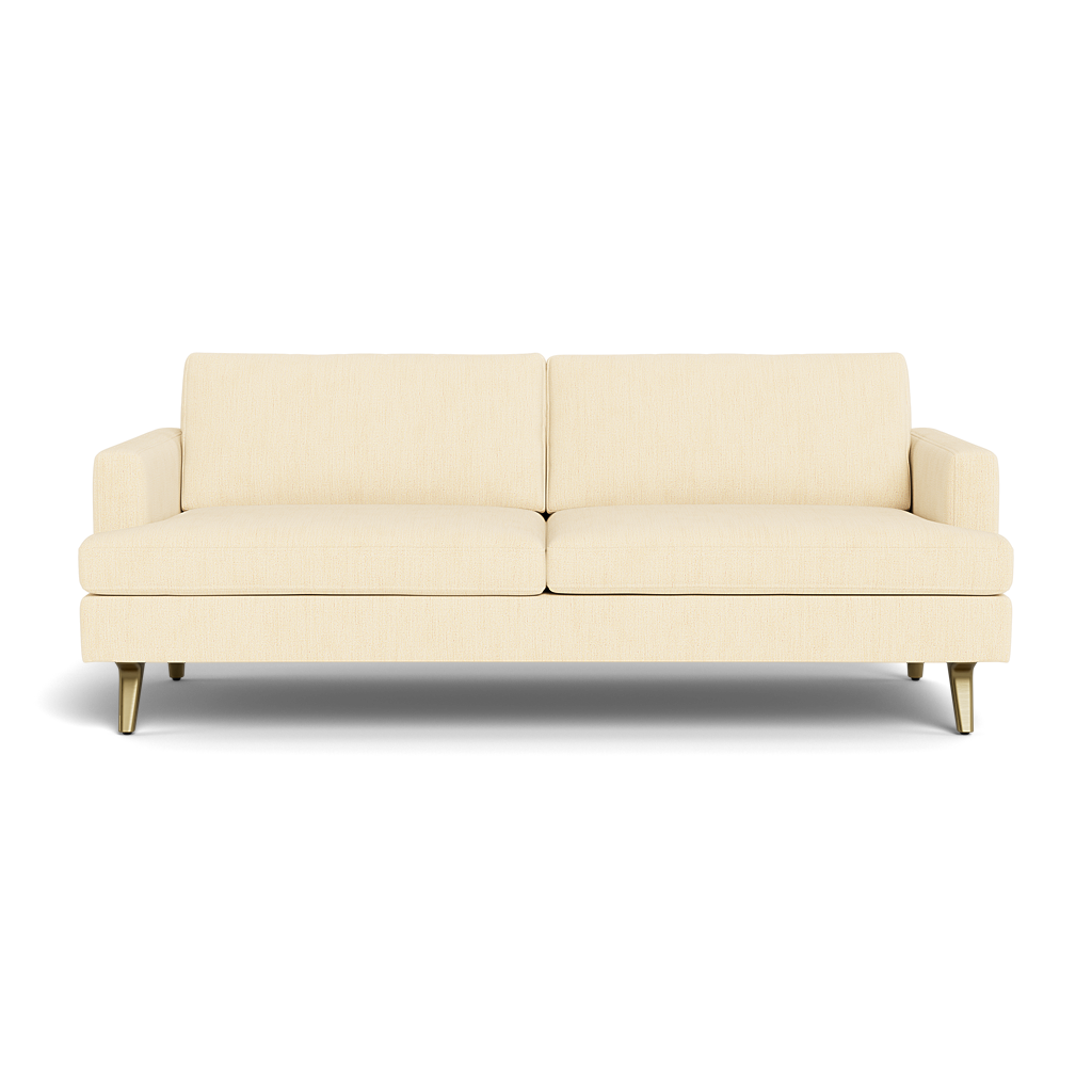 The Lido Sofa 75" is a modern light beige sofa featuring two seat and back cushions, slim armrests, and short angled wooden legs, set against a plain black background.