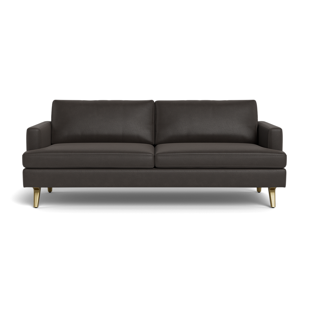 The Lido Sofa 75" is a modern dark gray sofa featuring two seat cushions, two back cushions, slim square armrests, and short gold metal legs, displayed against a plain black background.
