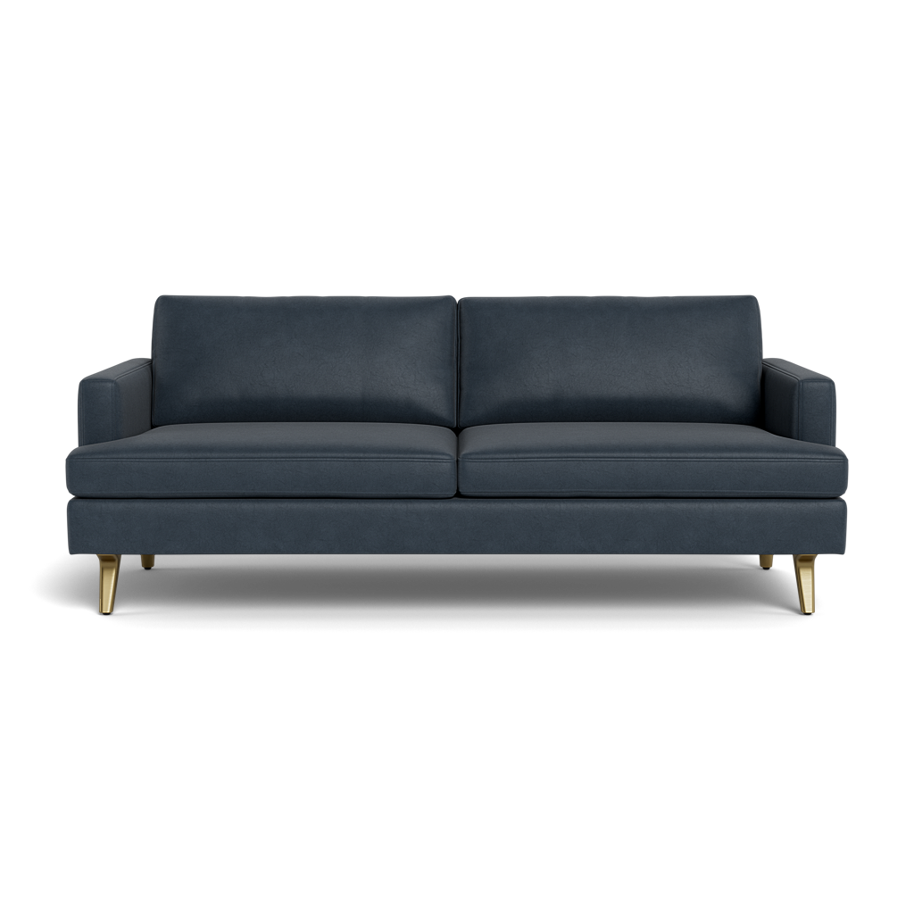 The Lido Sofa 75" is a modern dark blue sofa featuring two seat and back cushions, square arms, and four angled gold legs, shown from the front against a plain background.