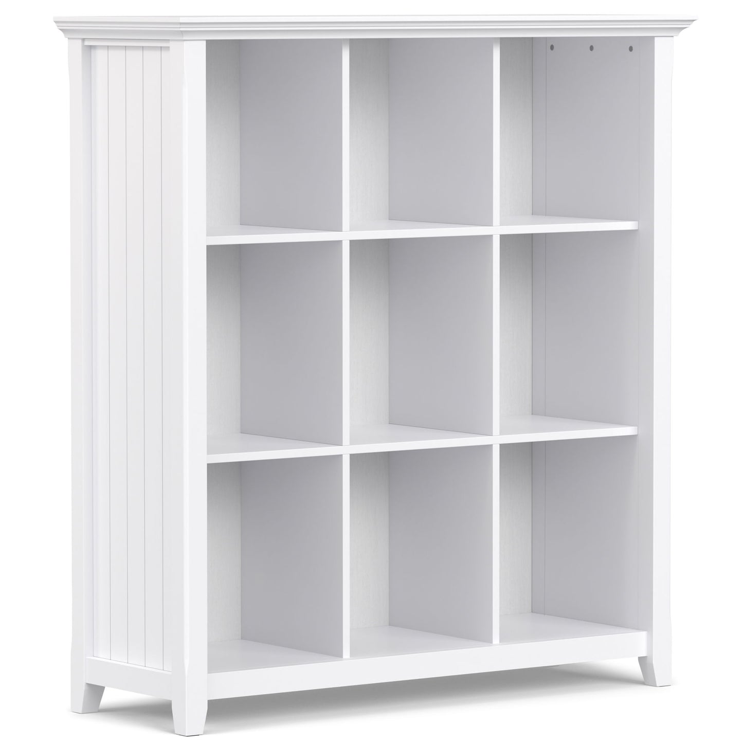 The Acadian - Handcrafted Cube Storage is a white wooden bookshelf with nine square compartments in a 3x3 grid, vertical side grooves, and a smooth flat top.