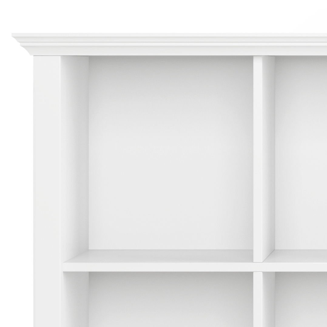 Close-up of the top section of the Acadian - Handcrafted Cube Storage, a white shelving unit with clean lines and a modern design. Four square compartments are visible against a plain white background.