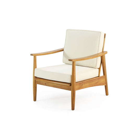 The Emmry - Outdoor Acacia Wood Club Chair features a mid-century modern design with a sturdy wooden frame and light cream cushions, shown against a plain white background.