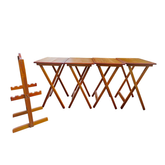 The Folding Trays With Storage Rack Snack Table (Set of 4) - Honey includes four polished wooden folding tables arranged in a row with a matching storage rack on the left, all in a warm honey finish.