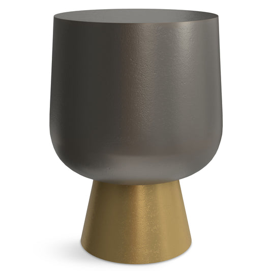 The Anthony - Cast Aluminum Side Table in bronze features a smooth, minimalist design with a matte dark gray rounded top and a metallic gold cone-shaped base.