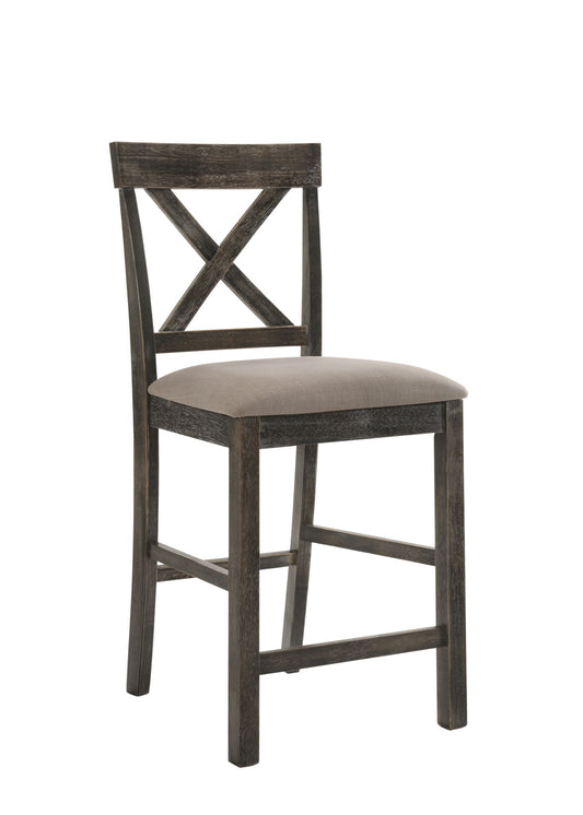 The Martha II Weathered Counter Height Chair (Set of 2) in Gray/Tan features a dark wood finish, X-shaped backrest, light gray upholstered seat cushion, straight legs, and a simple rustic design.