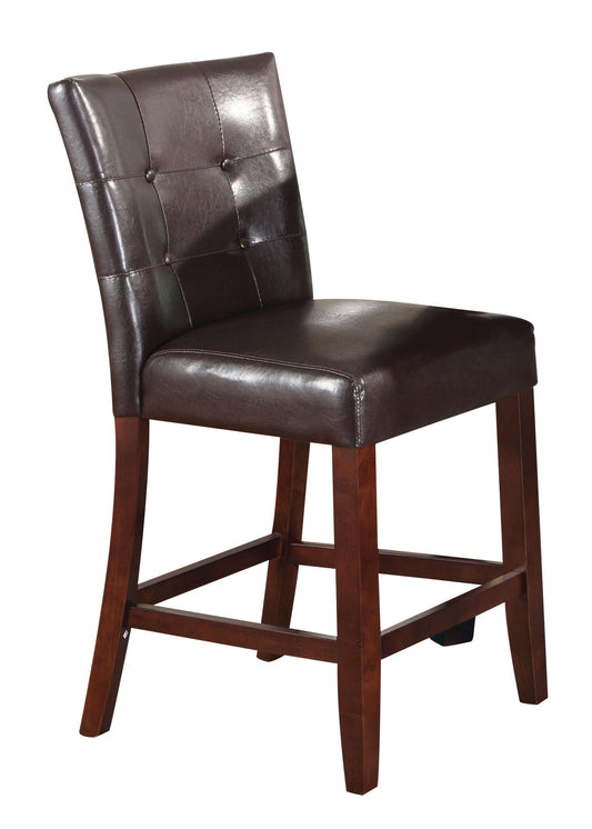 The Britney - Counter Height Chair (Set of 2) in Espresso features dark brown leather upholstery, a tufted backrest, wooden legs, a square seat, and built-in footrests.