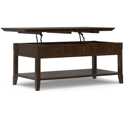 The Acadian Lift Top Coffee Table in brown features a modern rectangular design, a lift-top mechanism with hidden storage inside, and a lower shelf for added storage.