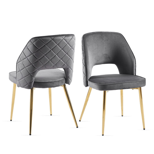Set of two Velvet Dining Chairs With Metal Legs And Hollow Back, featuring quilted gray velvet upholstery, open lower backs, and slim gold metal legs. One chair is pictured from the back, the other from the front.