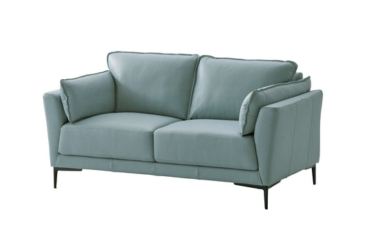 The Mesut - Top Grain Leather Loveseat in sage green features two seat and back cushions, two matching armrest pillows, sleek angled metal legs, and a minimalist design, shown against a white background.