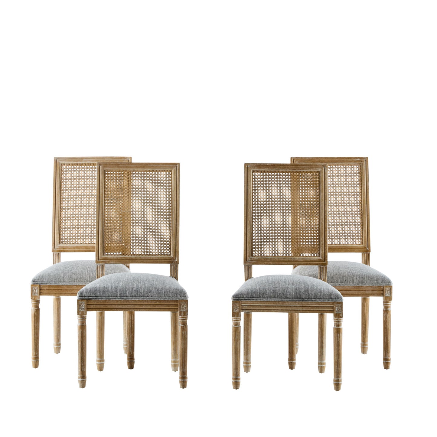 Four French Country Dining Chairs with rectangular cane backrests and smooth, light gray upholstered seats are arranged in two pairs against a plain white background.
