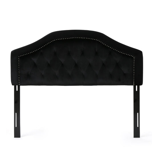 The Kaarina Contemporary Tufted Fabric Headboard features a black curved top, diamond tufting, silver nailhead trim, and two vertical support legs. Shown against a white background.