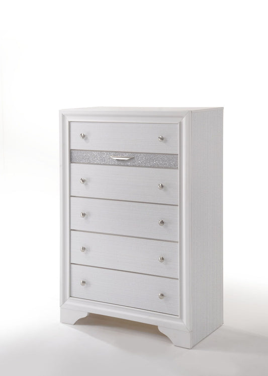 The Naima - Ample Storage Chest is a white five-drawer dresser with silver handles and a glittery accent on the second drawer, shown against a plain white background.
