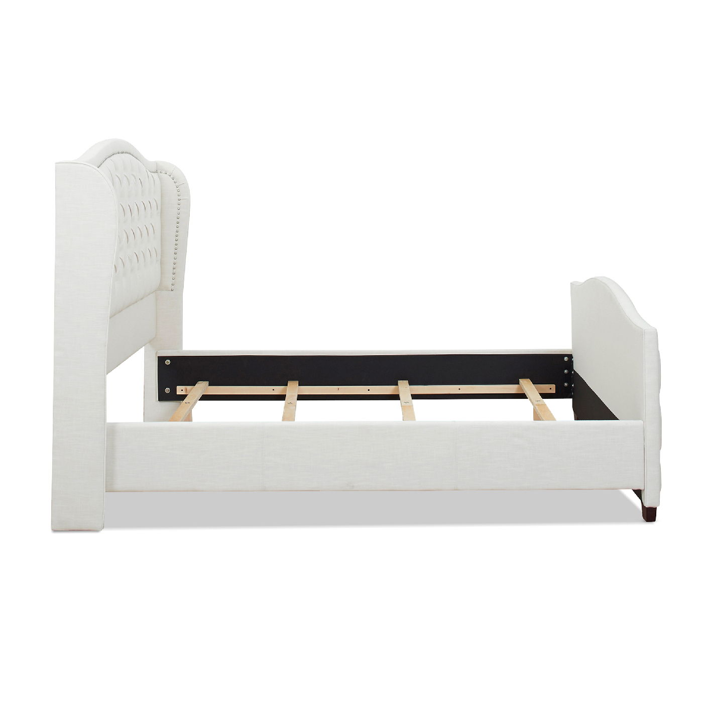 The Marcella Upholstered Shelter Headboard Bed Set features a white, tufted high headboard, a low footboard, wooden slats for mattress support (mattress not included), and showcases a modern, clean design.