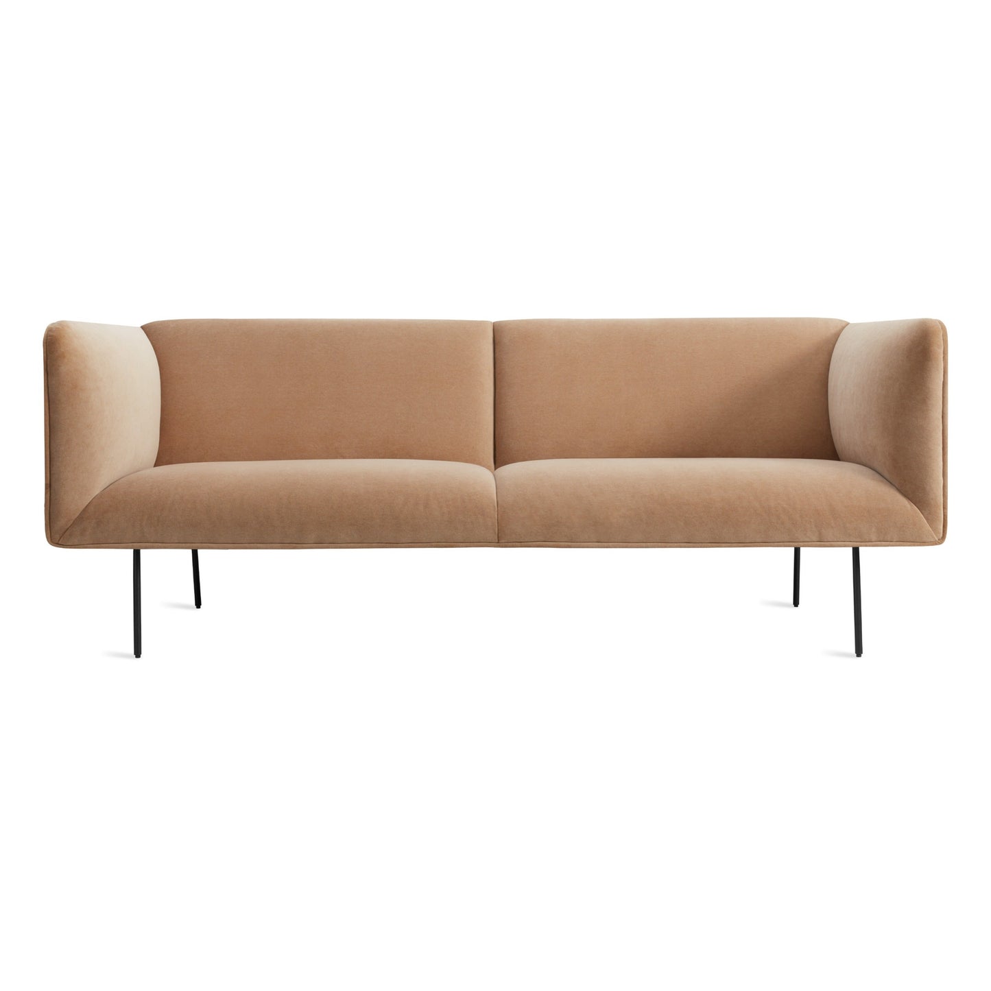 The Dandy Velvet Sofa in camel velvet features a modern, minimalist design with straight arms, cushioned seats, and thin black metal legs, set against a white background.