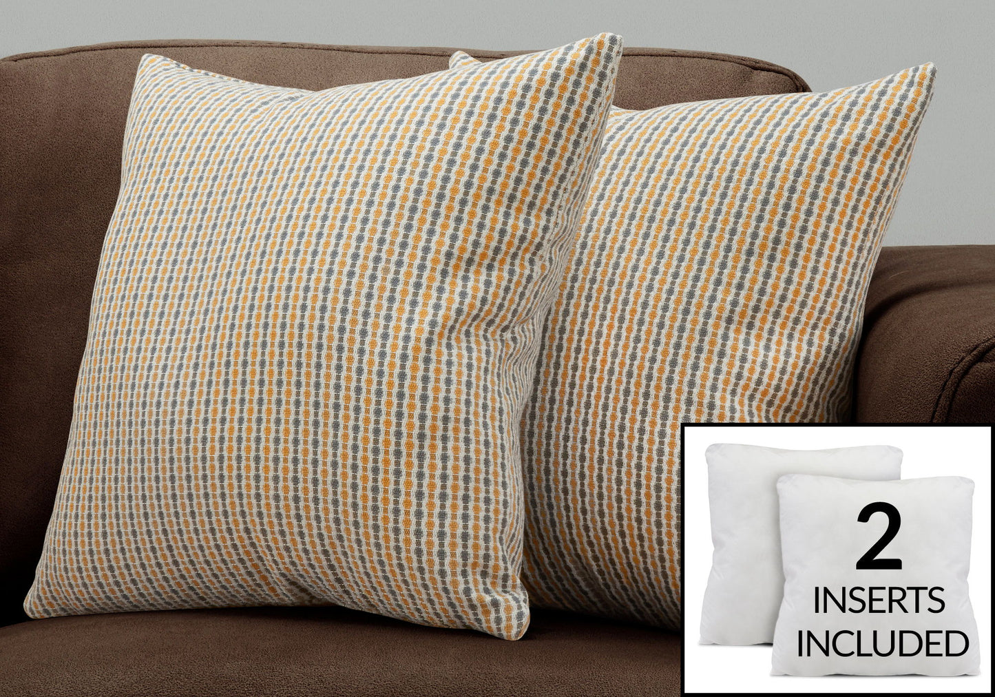 Two hypoallergenic square decorative throw pillows with yellow and blue geometric patterns sit on a brown couch. An inset displays two white pillow inserts labeled "Insert Included.