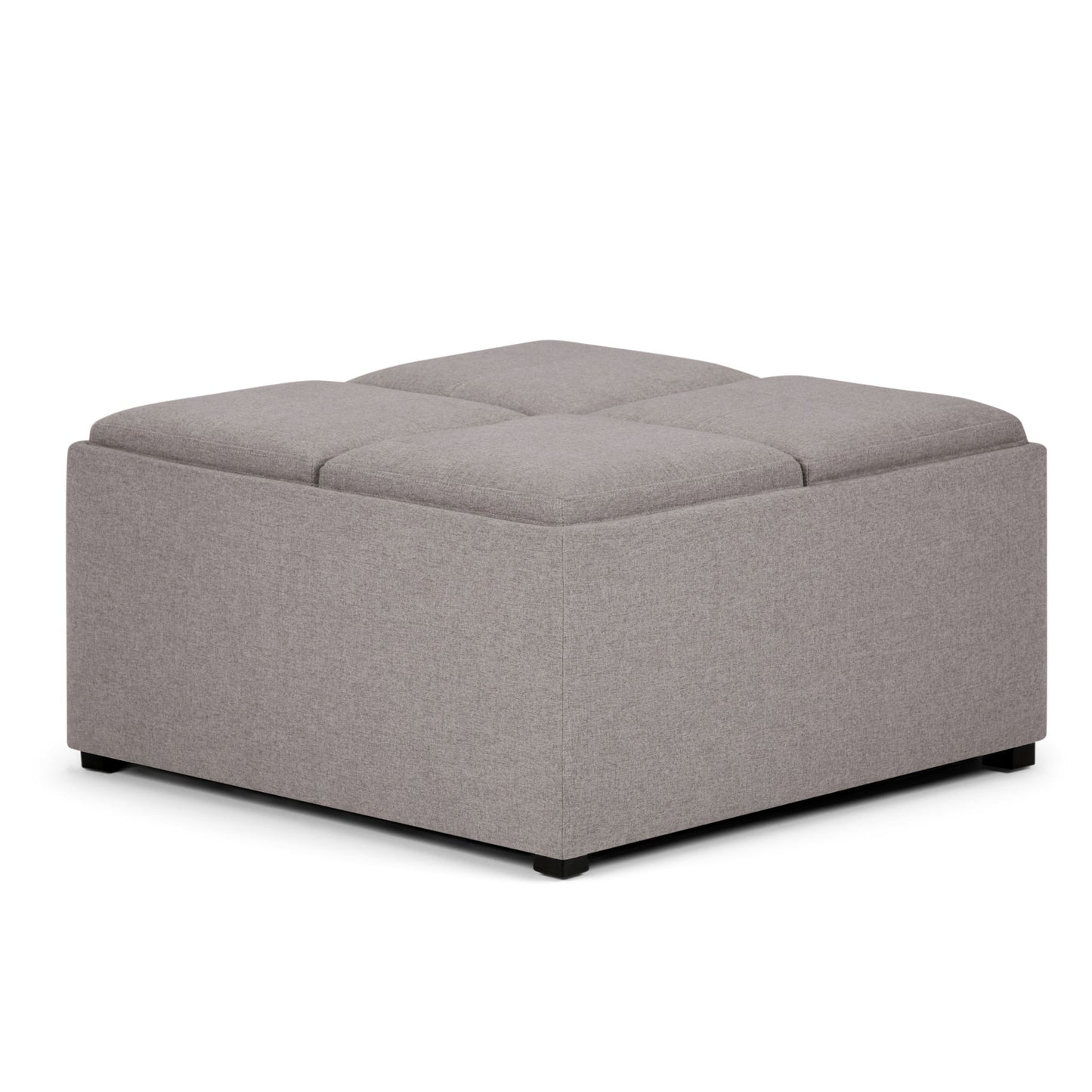 The Avalon Square Coffee Table Storage Ottoman features a large, square design with gray upholstery, a tufted top, low black feet, and clean modern lines.
