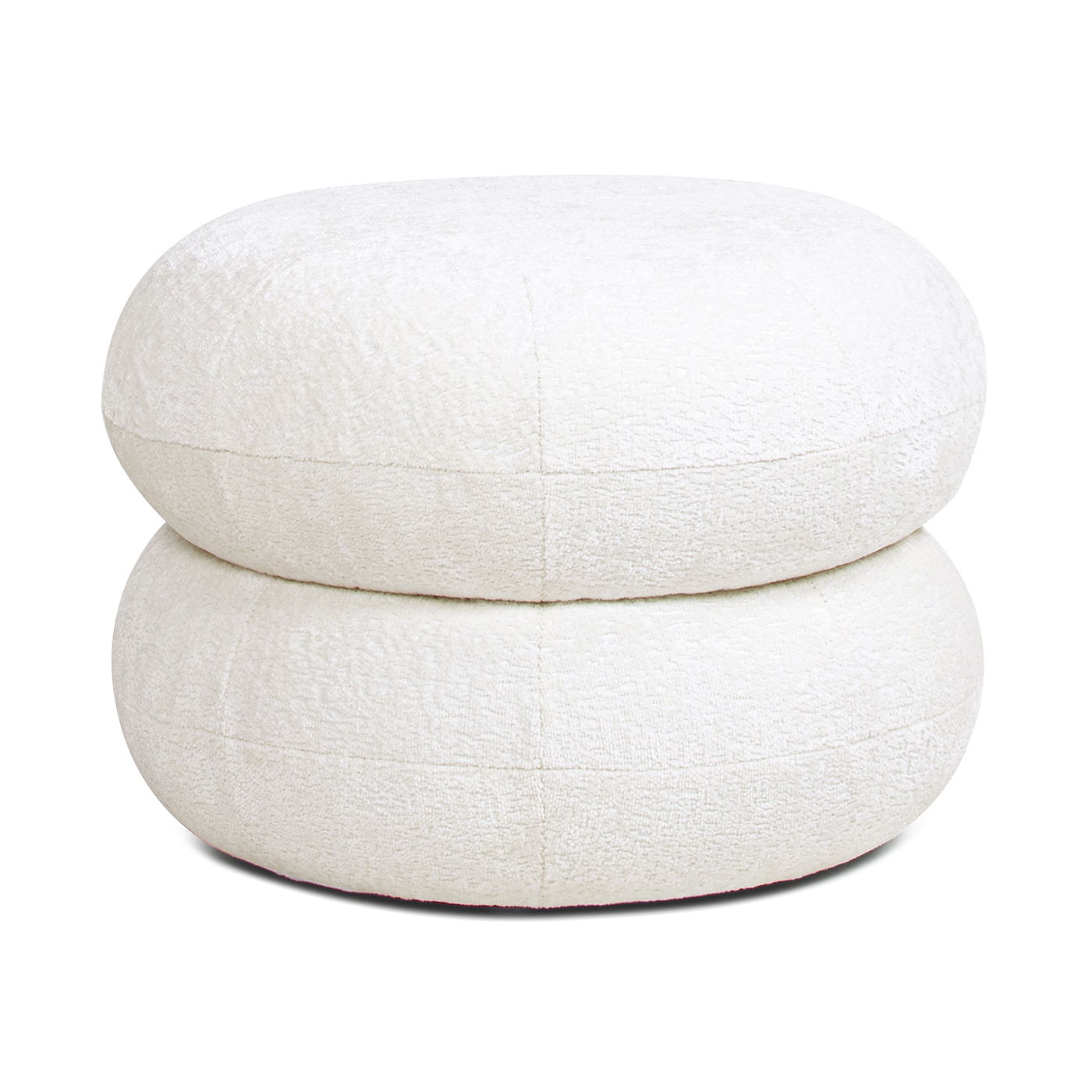 The Nest - Low Round Upholstered Ottoman is a white, plush ottoman with a double-stacked cushion design, soft textured fabric, and no visible legs.