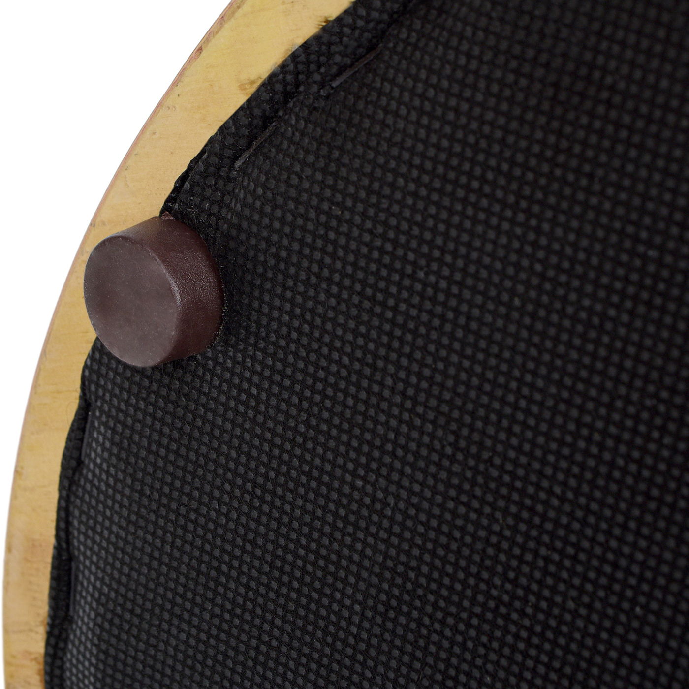 Close-up of the Nebula Backless Round Upholstered Counter Stool with Burl in Ivory White, featuring a black textured fabric surface and a dark brown cylindrical peg on the edge.