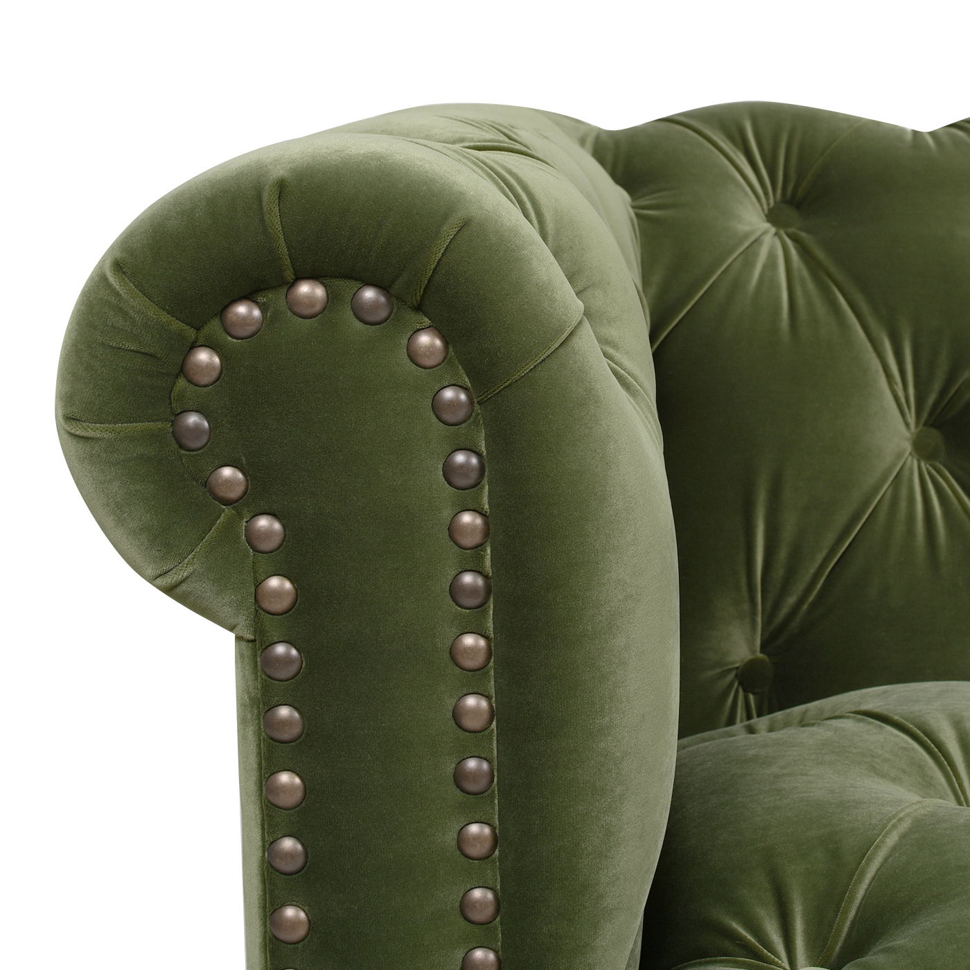 Close-up of the Alto - Tufted Chesterfield Sofa in green velvet, featuring rolled armrests, decorative metal stud accents along the edge, and button-tufted upholstery.