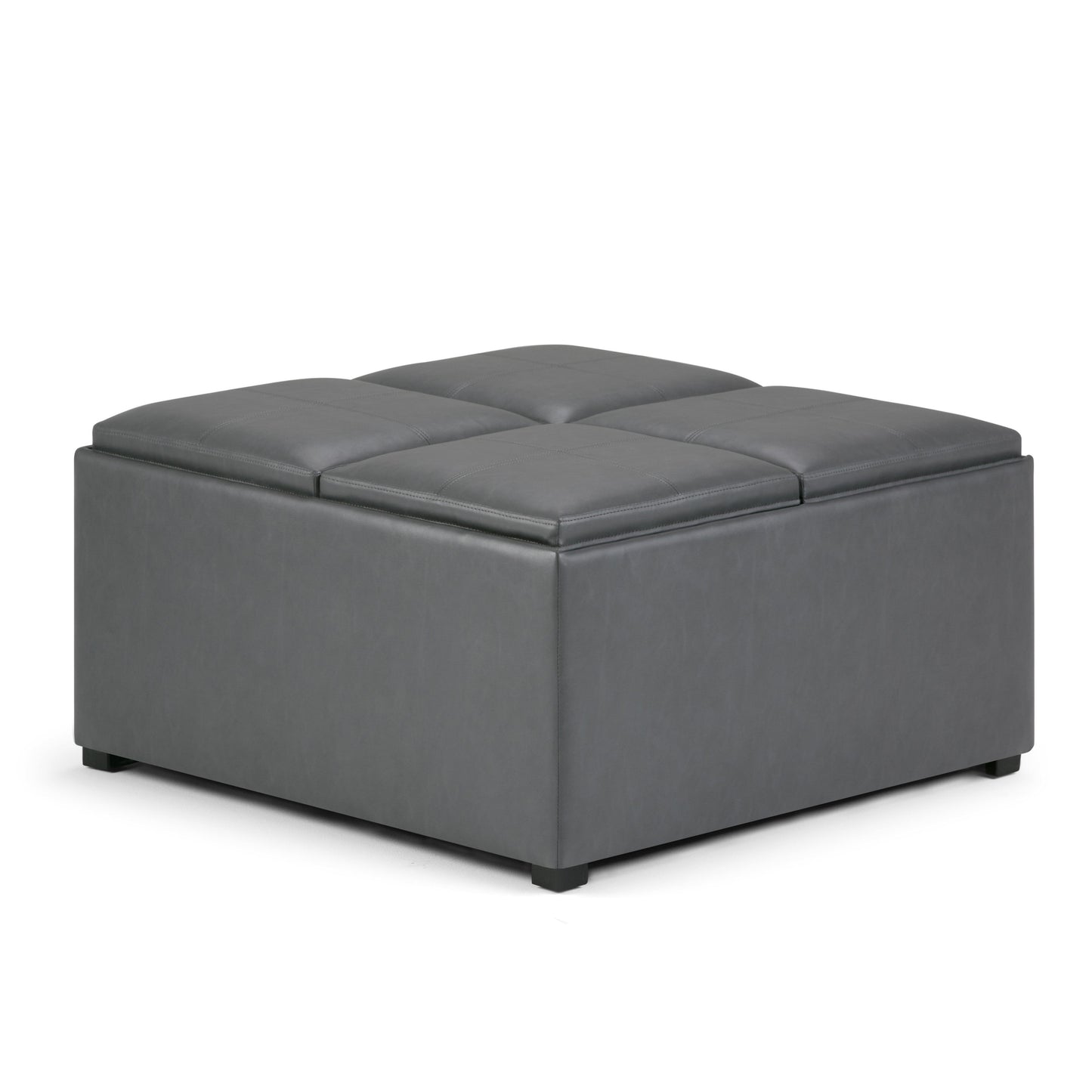 The Avalon Square Coffee Table Storage Ottoman features dark gray leather, a cushioned tufted top, and short black feet, shown on a white background.