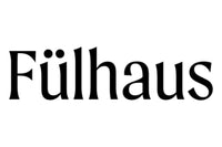 The image shows the word "Fülhaus" written in a bold, serif typeface. The letter "ü" is styled with an umlaut, and the overall design is clean and simple on a white background.