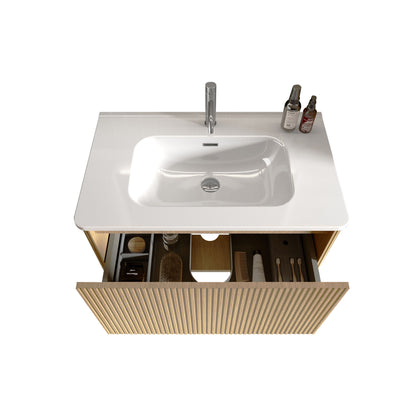 The Etna Striped Bathroom Vanity features a rectangular ceramic sink, sleek silver faucet, open wooden drawer stocked with toiletries, and three bottles on the countertop. This wall-mounted floating vanity is perfect for modern bathrooms.