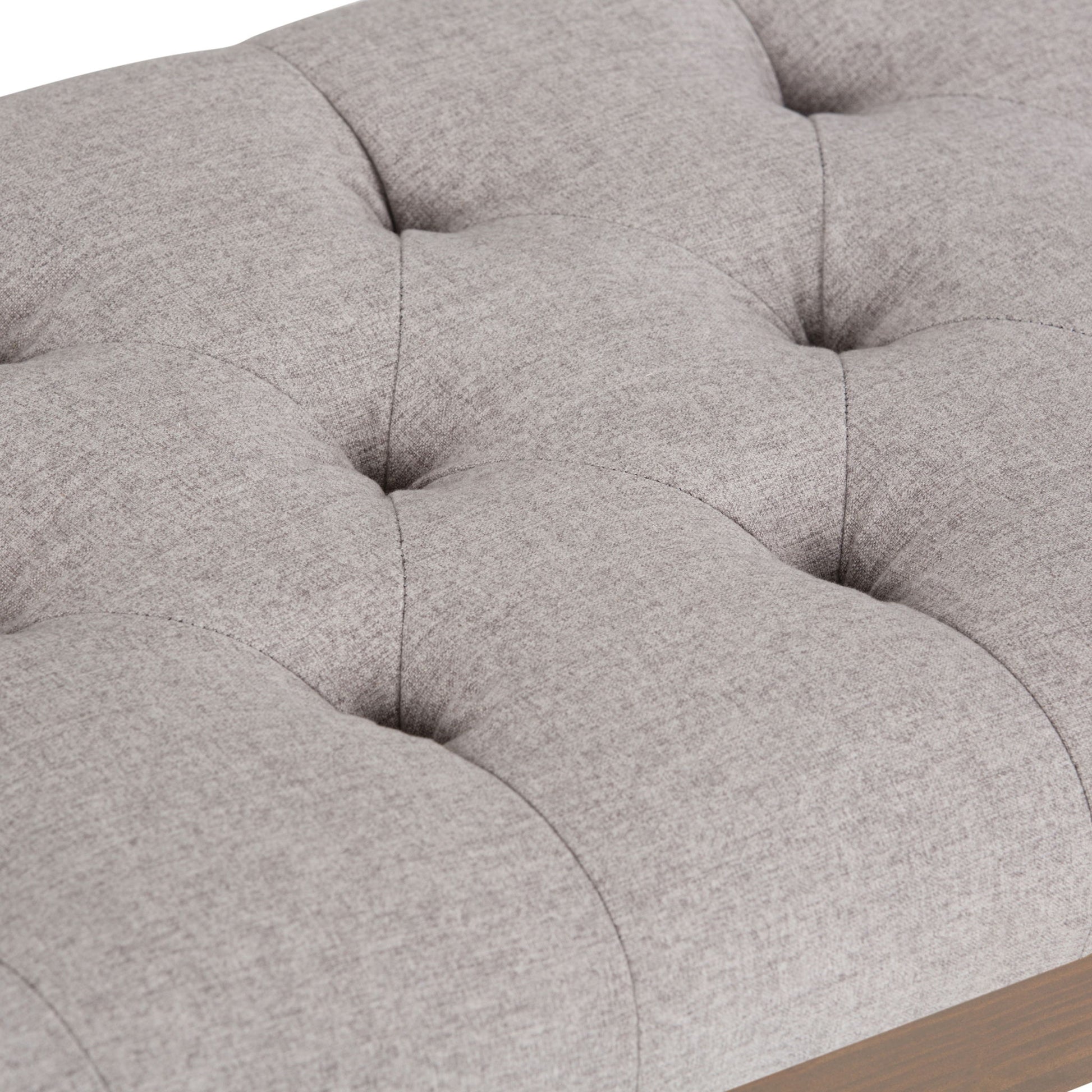 Close-up of the Waverly - Upholstered Tufted Ottoman Bench in light gray, featuring soft padding, smooth fabric upholstery, and elegant button tufting.