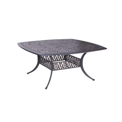 A Square 8 Person 64" Long Aluminum Dining Set With Cushions, featuring a metal frame with curved legs and ornate cut-out patterns on the tabletop and lower shelf, is shown against a white background.