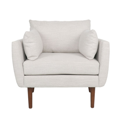 The Luminate Upholstered Fabric Club Chair features a modern, minimalist beige design with two accent pillows, a cushioned backrest, and tapered wooden legs.