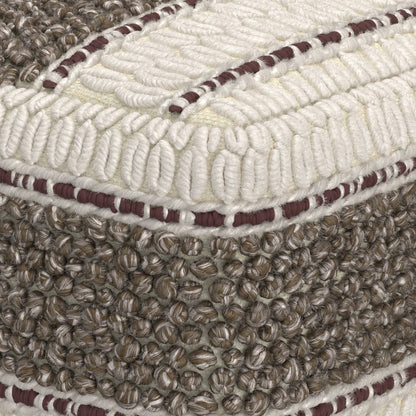 Close-up of the Grady - Handcrafted Square Pouf, showcasing cream and brown woven yarn loops with maroon accents. The corner highlights contrasting knit patterns and three-dimensional, textured details.