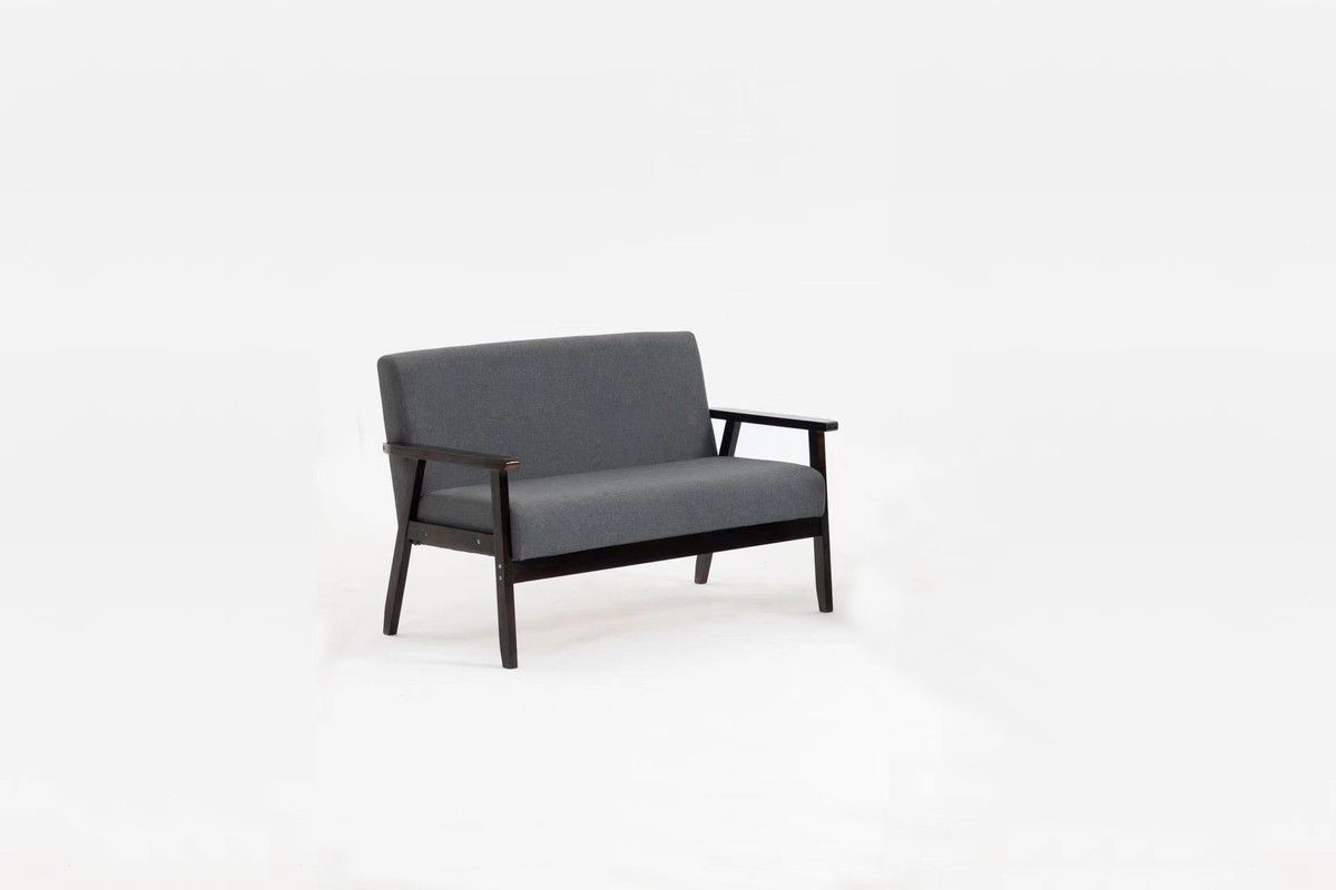 The Bahamas - Loveseat, a modern two-seater with dark wooden legs and armrests and grey upholstered cushions, is placed against a plain white background.