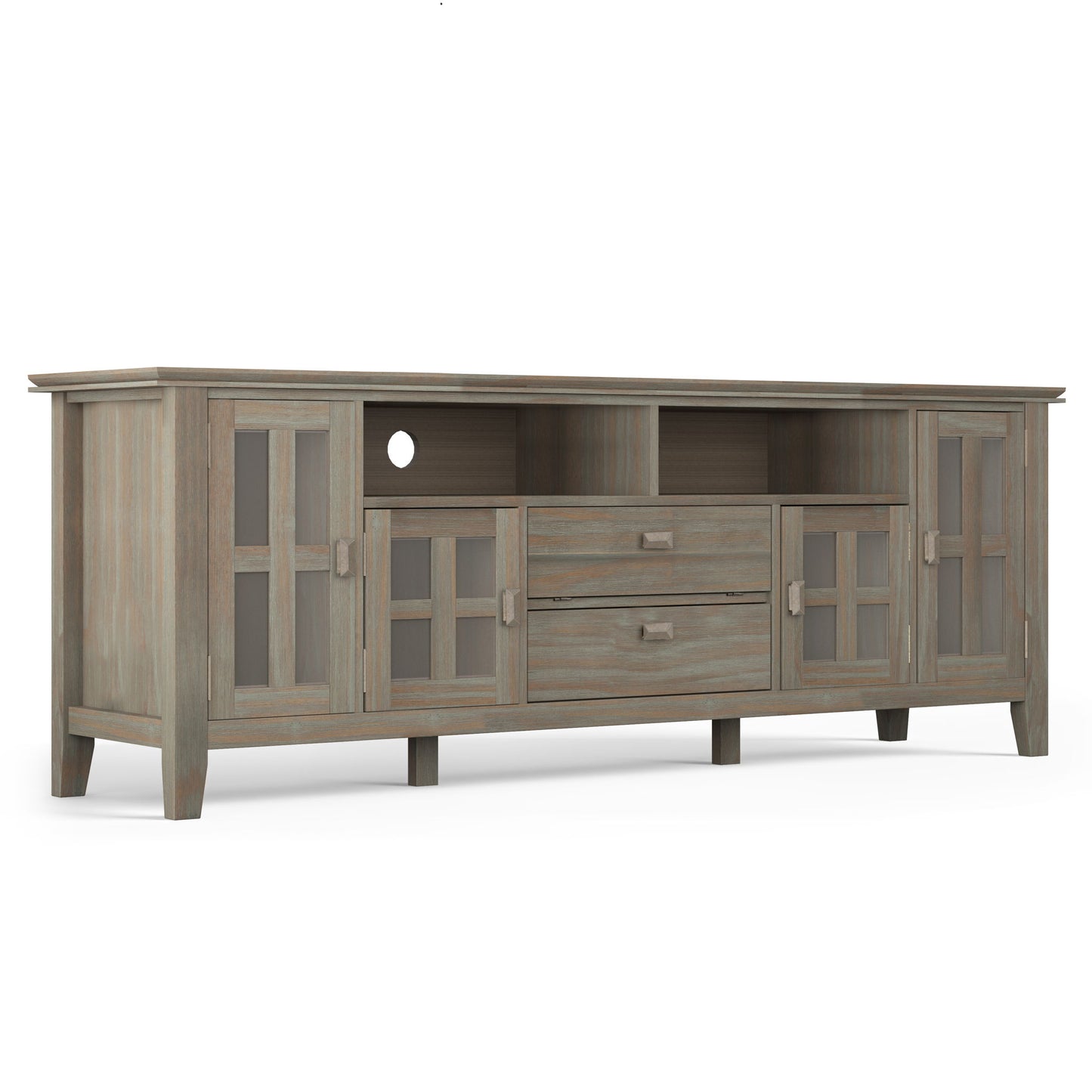 The Artisan TV Media Stand features a weathered gray wood finish, two glass-door cabinets on each side, two central drawers, and two open shelves above the drawers.