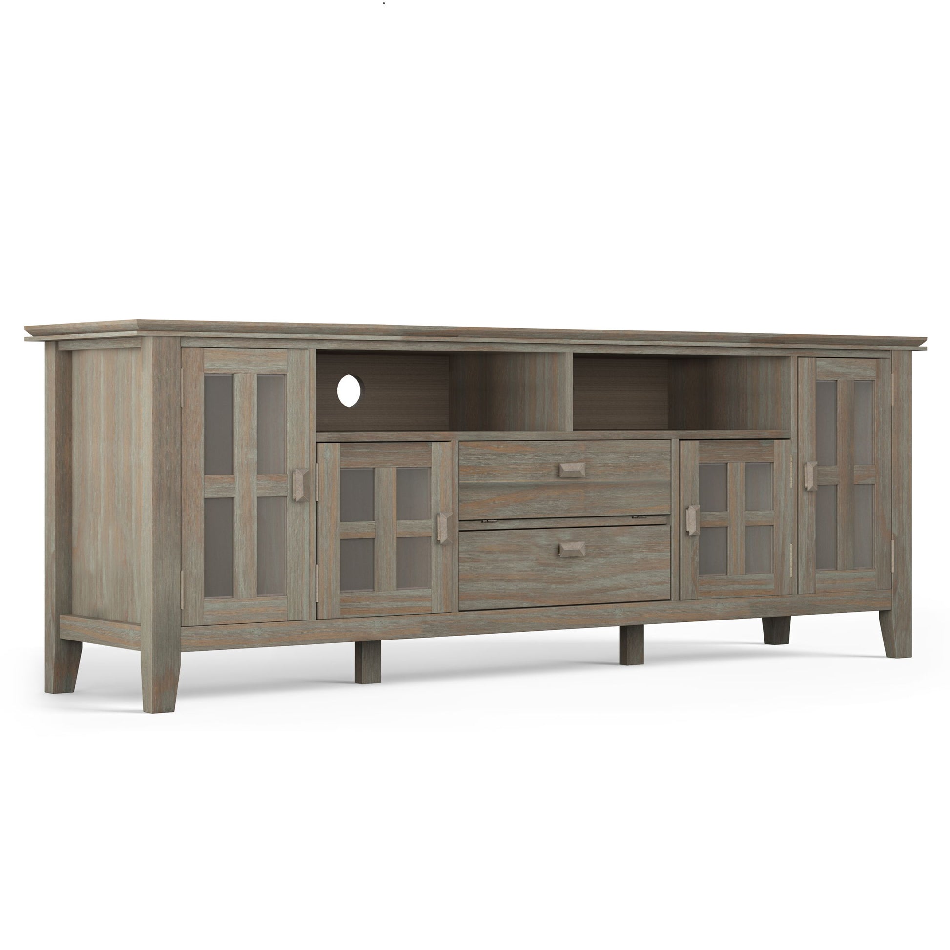 The Artisan TV Media Stand features a weathered gray wood finish, two glass-door cabinets on each side, two central drawers, and two open shelves above the drawers.