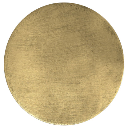 A round, flat, gold-colored metallic disc with a brushed texture, the Johnsen - Handcrafted Metal Coffee Table is displayed against a white background.