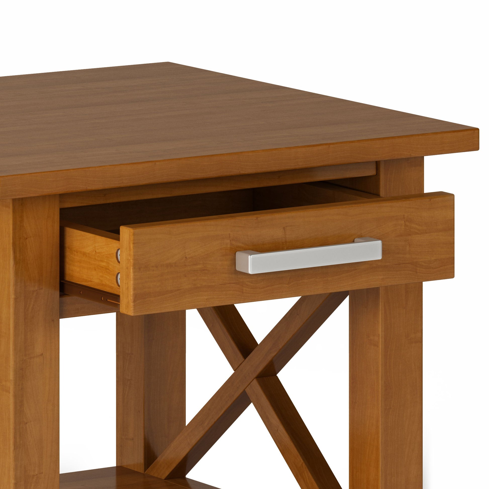 The Kitchener - Handcrafted Table features a rectangular wooden top, an open drawer with a silver handle, X-shaped side supports, and a lower shelf.