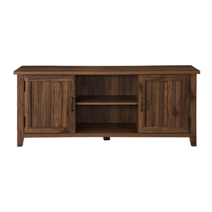 The Classic Grooved Door TV Stand for TVs up to 65" features a dark brown finish, two side cabinets with black metal handles, and two open center shelves. Its simple, modern design suits any living room.