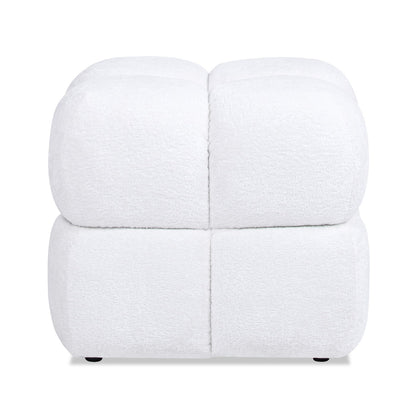 The Pixel Oversized Square Tufted Pouf Ottoman in Almond White features soft, textured upholstery with four cushioned segments on top and bottom, and short black feet for a modern look.