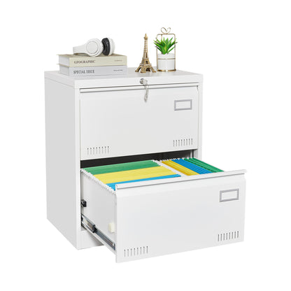 The Filing Cabinet Lateral File Cabinet 3 Drawer is a white locking metal cabinet. One open drawer reveals colorful hanging files. The top holds books, headphones, an Eiffel Tower statue, and a potted plant. The upper drawer features a lock.