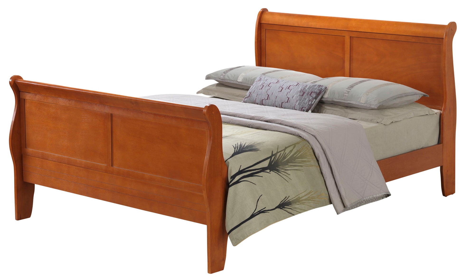 The Panel Sleigh Bed has a light brown wood finish and is styled with gray bedding, beige sheets, several pillows, and a comforter adorned with a subtle leaf pattern.