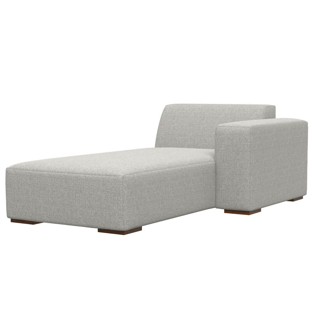 The Rex - Right Chaise Sofa Module in gray features modern upholstery, a low backrest, a right-side armrest, and short wooden block legs.