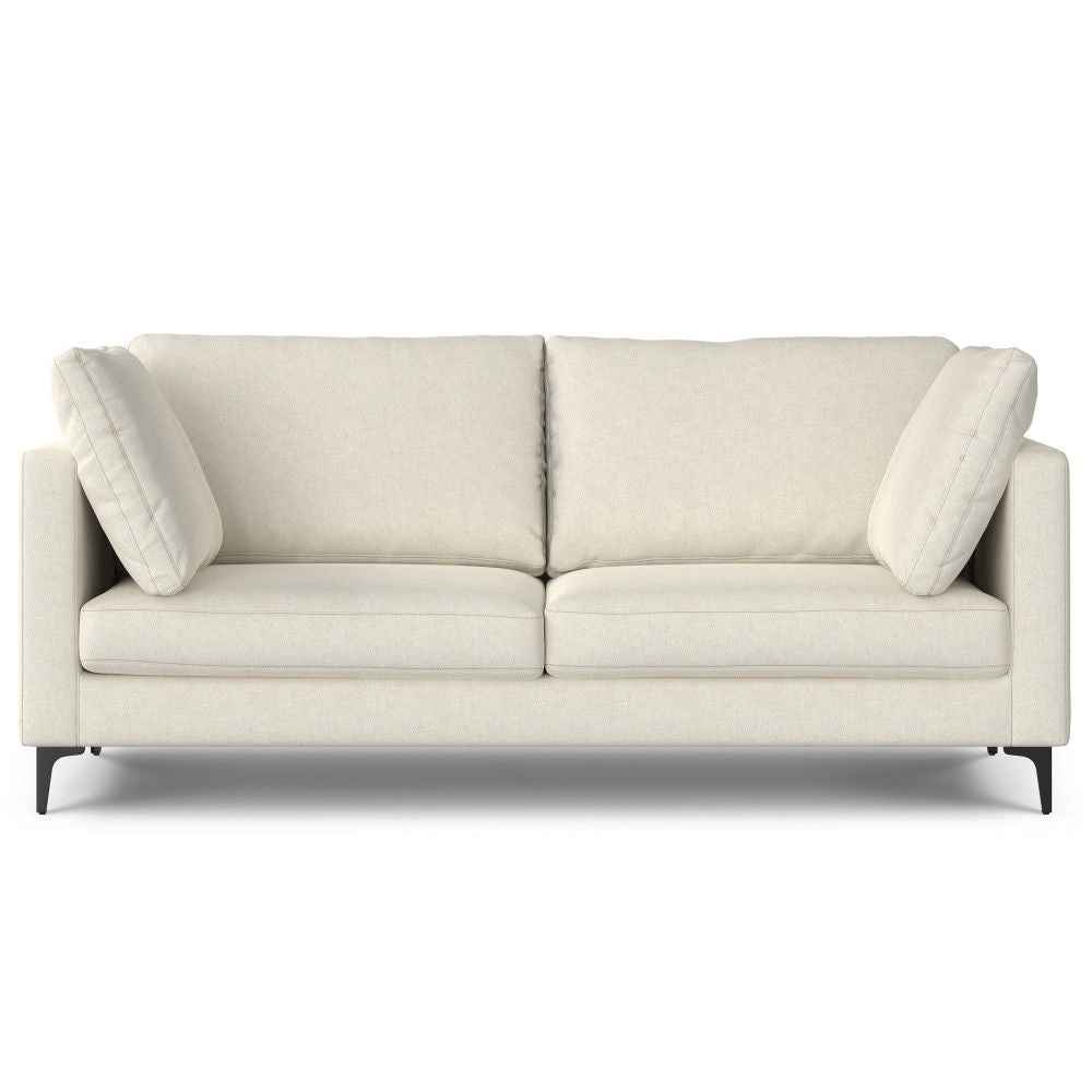 The Ava Mid Century Sofa features off-white upholstery, two seat and back cushions, two matching side pillows, and short black legs, combining modern style with comfort against a plain background.